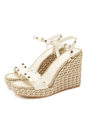 Женские кожаные босоножки valentino garavani rockstud torchon VALENTINO белого цвета по цене 54350 руб., арт. TW2S0K08/EMP | Фото 1 Женские кожаные босоножки valentino garavani rockstud torchon VALENTINO белого цвета, арт. TW2S0K08/EMP | Фото 1