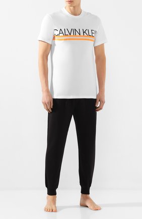 Мужские домашние джоггеры CALVIN KLEIN черного цвета по цене 7550 руб., арт. NM1771E | Фото 2 Мужские домашние джоггеры CALVIN KLEIN черного цвета, арт. NM1771E | Фото 2