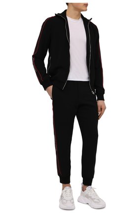 Мужской джоггеры из вискозы ALEXANDER MCQUEEN черного цвета по цене 69500 руб., арт. 595646/Q0R39 | Фото 2 Мужской джоггеры из вискозы ALEXANDER MCQUEEN черного цвета, арт. 595646/Q0R39 | Фото 2