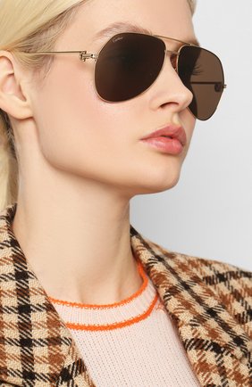 Мужские солнцезащитные очки CARTIER золотого цвета по цене 73500 руб., арт. CT0110 014 | Фото 2 Мужские солнцезащитные очки CARTIER золотого цвета, арт. CT0110 014 | Фото 2