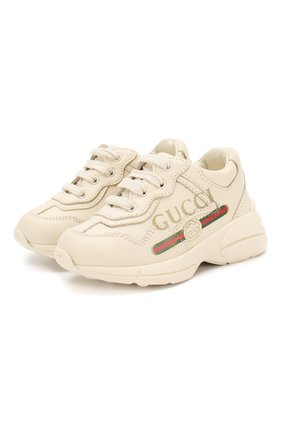 Детские кожаные кроссовки GUCCI белого цвета по цене 37700 руб., арт. 579317/DRW00 | Фото 1 Детские кожаные кроссовки GUCCI белого цвета, арт. 579317/DRW00 | Фото 1 (Материал внутренний: Натуральная кожа; Стили: Гранж)
