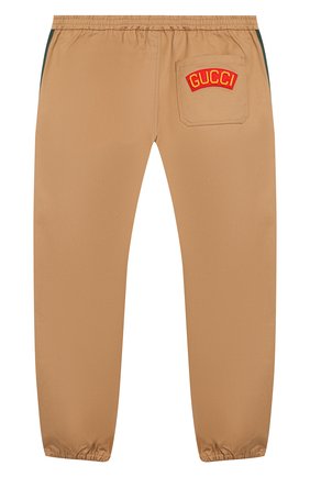 Детские хлопковые брюки GUCCI бежевого цвета по цене 24100 руб., арт. 573995/XWAEW | Фото 2 Детские хлопковые брюки GUCCI бежевого цвета, арт. 573995/XWAEW | Фото 2