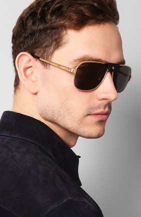 Мужские солнцезащитные очки CARTIER золотого цвета по цене 74150 руб., арт. CT0165 007 | Фото 2 Мужские солнцезащитные очки CARTIER золотого цвета, арт. CT0165 007 | Фото 2