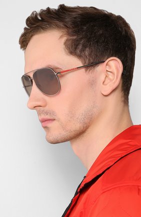 Женские солнцезащитные очки PRADA LINEA ROSSA серого цвета по цене 14500 руб., арт. 55US-5AV1X1 | Фото 3 Женские солнцезащитные очки PRADA LINEA ROSSA серого цвета, арт. 55US-5AV1X1 | Фото 3