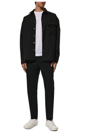 Мужской хлопковые брюки PRADA синего цвета по цене 46500 руб., арт. SPE12-1GQS-F0008-172 | Фото 2 Мужской хлопковые брюки PRADA синего цвета, арт. SPE12-1GQS-F0008-172 | Фото 2