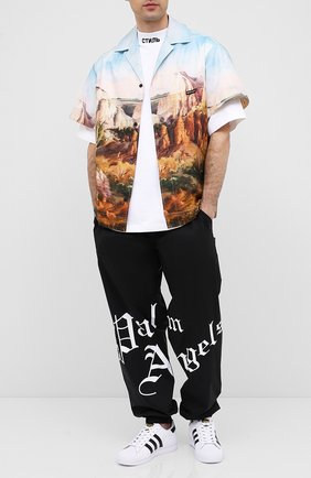 Мужские кожаные кеды superstar ADIDAS ORIGINALS белого цвета по цене 8550 руб., арт. EG4958 | Фото 2 Мужские кожаные кеды superstar ADIDAS ORIGINALS белого цвета, арт. EG4958 | Фото 2