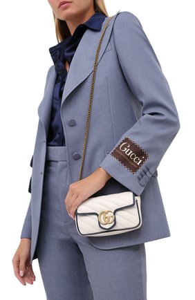 Женская сумка gg marmont super mini GUCCI белого цвета по цене 73850 руб., арт. 574969/00LFX | Фото 2 Женская сумка gg marmont super mini GUCCI белого цвета, арт. 574969/00LFX | Фото 2