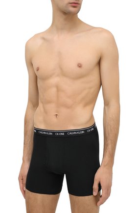 Мужские хлопковые боксеры CALVIN KLEIN черного цвета по цене 3115 руб., арт. NB2217A | Фото 2 Мужские хлопковые боксеры CALVIN KLEIN черного цвета, арт. NB2217A | Фото 2