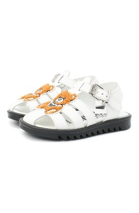 Детские кожаные босоножки MOSCHINO белого цвета по цене 15950 руб., арт. 65569/GUM/18-27 | Фото 1 Детские кожаные босоножки MOSCHINO белого цвета, арт. 65569/GUM/18-27 | Фото 1