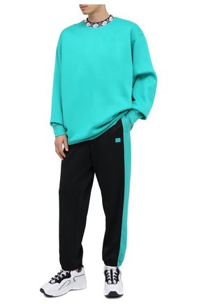 Мужской джоггеры ACNE STUDIOS черного цвета по цене 28100 руб., арт. CK0018/M | Фото 2 Мужской джоггеры ACNE STUDIOS черного цвета, арт. CK0018/M | Фото 2