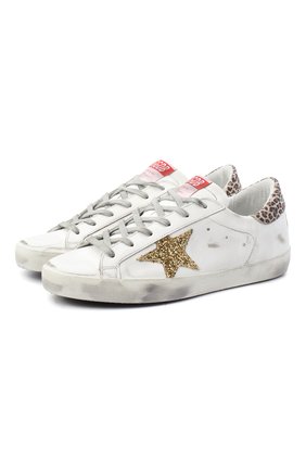 Женские кожаные кеды superstar GOLDEN GOOSE DELUXE BRAND белого цвета по цене 32800 руб., арт. GWF00101.F000166 | Фото 1 Женские кожаные кеды superstar GOLDEN GOOSE DELUXE BRAND белого цвета, арт. GWF00101.F000166 | Фото 1