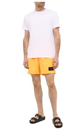 Детского плавки-шорты CALVIN KLEIN оранжевого цвета по цене 8380 руб., арт. KM0KM00458 | Фото 2 Детского плавки-шорты CALVIN KLEIN оранжевого цвета, арт. KM0KM00458 | Фото 2