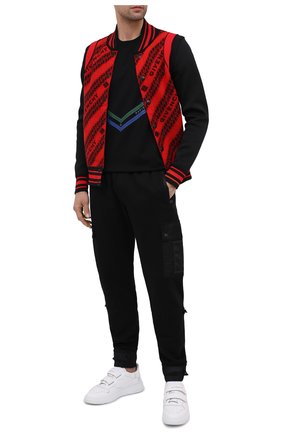 Мужской хлопковые джоггеры DOLCE & GABBANA черного цвета по цене 75200 руб., арт. GWU9AZ/FU7DU | Фото 2 Мужской хлопковые джоггеры DOLCE & GABBANA черного цвета, арт. GWU9AZ/FU7DU | Фото 2