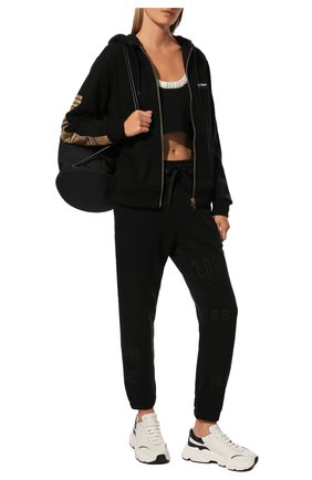Женские хлопковые джоггеры BURBERRY черного цвета по цене 39500 руб., арт. 8036102 | Фото 2 Женские хлопковые джоггеры BURBERRY черного цвета, арт. 8036102 | Фото 2