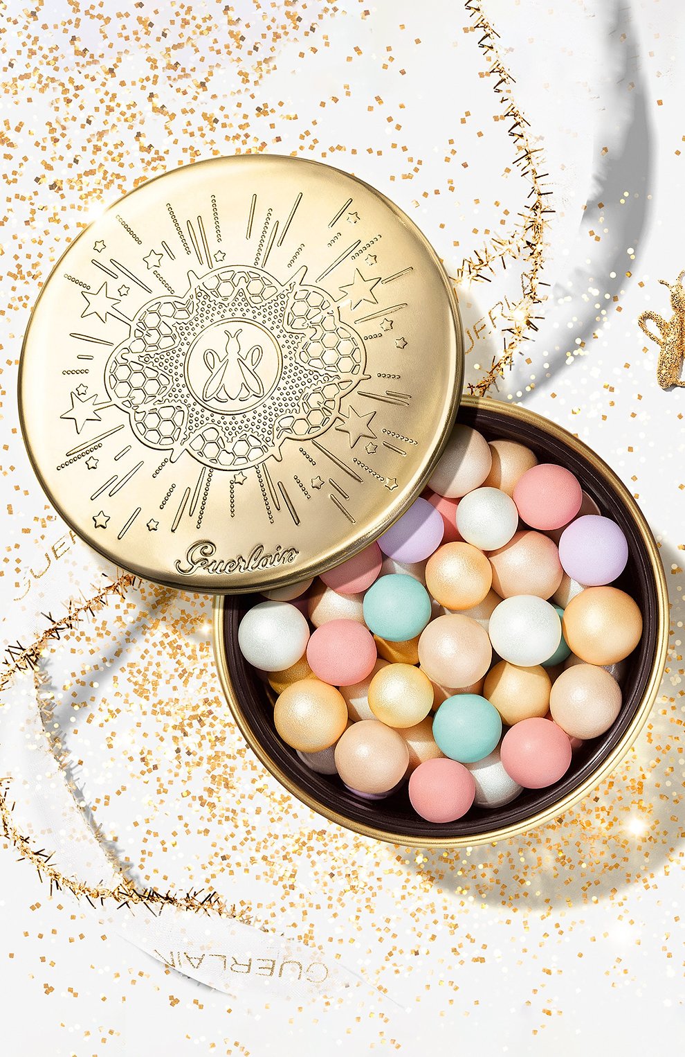 Пудра для лица в шариках météorites golden bee (25g) GUERLAIN бесцветного цвета по цене 0 руб., арт. G043348 | Фото 3 Пудра для лица в шариках météorites golden bee (25g) GUERLAIN бесцветного цвета, арт. G043348 | Фото 3