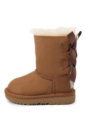 Детские угги bailey bow ii UGG коричневого цвета по цене 12250 руб., арт. 1017394T_CHE | Фото 2 Детские угги bailey bow ii UGG коричневого цвета, арт. 1017394T_CHE | Фото 2 (Материал внешний: Замша; Материал утеплителя: Шерсть; Кросс-КТ: полусапоги)