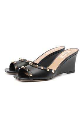 Женские кожаные мюли rockstud VALENTINO черного цвета по цене 51400 руб., арт. VW2S0BC6/V0D | Фото 1 Женские кожаные мюли rockstud VALENTINO черного цвета, арт. VW2S0BC6/V0D | Фото 1 (Каблук тип: Танкетка; Подошва: Плоская; Материал внутренний: Натуральная кожа; Каблук высота: Средний; Материал внешний: Кожа)