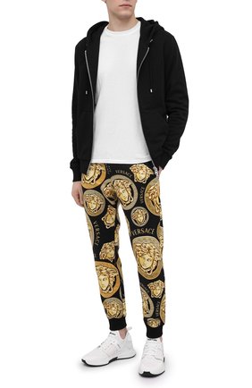 Мужские хлопковые джоггеры VERSACE золотого цвета по цене 73600 руб., арт. A88739/1F00721 | Фото 2 Мужские хлопковые джоггеры VERSACE золотого цвета, арт. A88739/1F00721 | Фото 2