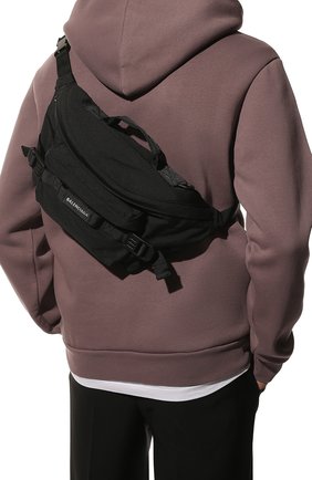 Мужская текстильная поясная сумка army BALENCIAGA черного цвета по цене 89100 руб., арт. 644035/2BKPI | Фото 2 Мужская текстильная поясная сумка army BALENCIAGA черного цвета, арт. 644035/2BKPI | Фото 2 (Случай: Повседневный; Ремень/цепочка: На ремешке; Материал: Текстиль; Размер: large)