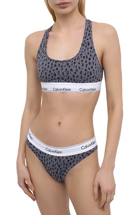 Женские трусы-стринги CALVIN KLEIN JEANS серого цвета по цене 2595 руб., арт. F3786E | Фото 2 Женские трусы-стринги CALVIN KLEIN JEANS серого цвета, арт. F3786E | Фото 2