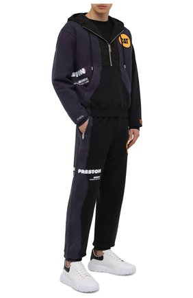 Мужские хлопковые джоггеры heron preston x cat HERON PRESTON черного цвета по цене 41050 руб., арт. HMCH022S21JER0011018 | Фото 2 Мужские хлопковые джоггеры heron preston x cat HERON PRESTON черного цвета, арт. HMCH022S21JER0011018 | Фото 2