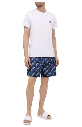 Мужские плавки-шорты CALVIN KLEIN синего цвета по цене 8875 руб., арт. KM0KM00550 | Фото 2 Мужские плавки-шорты CALVIN KLEIN синего цвета, арт. KM0KM00550 | Фото 2