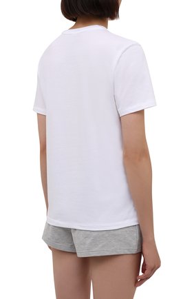 Женская футболка CALVIN KLEIN белого цвета по цене 4995 руб., арт. QS6689E | Фото 4 Женская футболка CALVIN KLEIN белого цвета, арт. QS6689E | Фото 4 (Рукава: Короткие; Материал внешний: Синтетический материал, Хлопок; Длина (для топов): Стандартные; Женское Кросс-КТ: Футболка-белье)