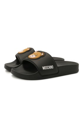 Детские шлепанцы MOSCHINO черного цвета по цене 8995 руб., арт. 68948/PVC/36-41 | Фото 1 Детские шлепанцы MOSCHINO черного цвета, арт. 68948/PVC/36-41 | Фото 1 (Материал внешний: Резина)