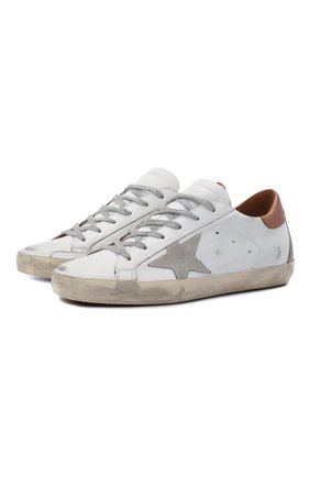 Женские кожаные кеды superstar GOLDEN GOOSE DELUXE BRAND белого цвета по цене 35650 руб., арт. GWF00102.F002182 | Фото 1 Женские кожаные кеды superstar GOLDEN GOOSE DELUXE BRAND белого цвета, арт. GWF00102.F002182 | Фото 1