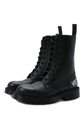 Женские кожаные ботинки VETEMENTS черно-белого цвета по цене 109000 руб., арт. UA52B0200B 2414/W | Фото 1 Женские кожаные ботинки VETEMENTS черно-белого цвета, арт. UA52B0200B 2414/W | Фото 1 (Материал внутренний: Натуральная кожа; Подошва: Платформа; Каблук высота: Низкий; Женское Кросс-КТ: Военные ботинки; Материал внешний: Кожа)