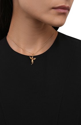 Женская кулон на цепочке SAINT LAURENT золотого цвета по цене 26550 руб., арт. 667513/Y1500 | Фото 2 Женская кулон на цепочке SAINT LAURENT золотого цвета, арт. 667513/Y1500 | Фото 2 (Материал: Металл)
