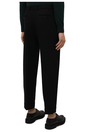 Мужские шерстяные брюки SAINT LAURENT черного цвета, арт. 653846/Y1D08 | Фото 4 (Материал внешний: Шерсть; Длина (брюки, джинсы): Стандартные; Случай: Повседневный; Стили: Минимализм; Материал подклада: Шелк)