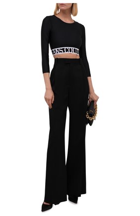 Женский топ VERSACE JEANS COUTURE черного цвета по цене 11250 руб., арт. 71HAH218-71DP218 SHINY LYCRA SUMATRA/N0008 | Фото 2 Женский топ VERSACE JEANS COUTURE черного цвета, арт. 71HAH218-71DP218 SHINY LYCRA SUMATRA/N0008 | Фото 2 (Рукава: 3/4; Материал внешний: Синтетический материал; Длина (для топов): Укороченные; Женское Кросс-КТ: Топ-спорт; Стили: Спорт-шик)