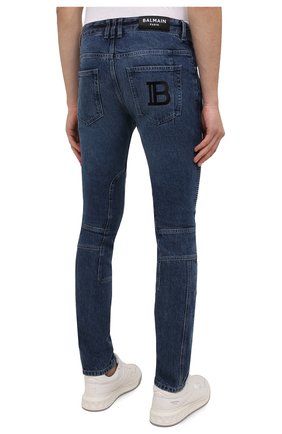 Мужские джинсы BALMAIN синего цвета, арт. WH0MG045/163D | Фото 4 (Силуэт М (брюки): Узкие; Кросс-КТ: Деним; Длина (брюки, джинсы): Стандартные; Стили: Гранж; Материал внешний: Хлопок; Детали: Потертости)