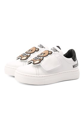 Детские кожаные кеды MOSCHINO белого цвета по цене 29950 руб., арт. 70215/KIPS/KIPS/28-35 | Фото 1 Детские кожаные кеды MOSCHINO белого цвета, арт. 70215/KIPS/KIPS/28-35 | Фото 1 (Материал внутренний: Натуральная кожа; Материал внешний: Кожа; Длина стельки: 22,5, 17,9, 19,1, 20,2, 22, 21,2, 19,6, 18,5; Мальчики Кросс-КТ: Обувь-низкие; Кросс-КТ: велькро)