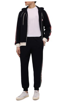 Мужские шерстяные джоггеры GUCCI темно-синего цвета по цене 146000 руб., арт. 673329/XJDUW | Фото 2 Мужские шерстяные джоггеры GUCCI темно-синего цвета, арт. 673329/XJDUW | Фото 2 (Длина (брюки, джинсы): Стандартные; Материал внешний: Шерсть; Мужское Кросс-КТ: Брюки-трикотаж; Силуэт М (брюки): Джоггеры; Стили: Спорт-шик)