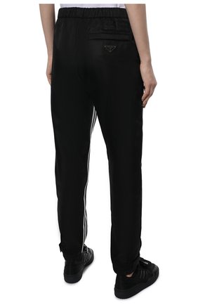 Мужского брюки adidas for prada re-nylon PRADA черного цвета по цене 81000 руб., арт. SPH155-1WQ8-F0002-212 | Фото 4 Мужского брюки adidas for prada re-nylon PRADA черного цвета, арт. SPH155-1WQ8-F0002-212 | Фото 4 (Материал внешний: Синтетический материал)