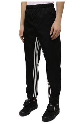 Мужского брюки adidas for prada re-nylon PRADA черного цвета по цене 81000 руб., арт. SPH155-1WQ8-F0002-212 | Фото 6 Мужского брюки adidas for prada re-nylon PRADA черного цвета, арт. SPH155-1WQ8-F0002-212 | Фото 6 (Материал внешний: Синтетический материал)