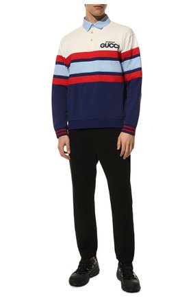 Мужские хлопковые джоггеры GUCCI черного цвета по цене 94750 руб., арт. 669643/XDBS0 | Фото 2 Мужские хлопковые джоггеры GUCCI черного цвета, арт. 669643/XDBS0 | Фото 2 (Материал внешний: Хлопок; Длина (брюки, джинсы): Стандартные; Случай: Повседневный; Стили: Кэжуэл; Силуэт М (брюки): Джоггеры)
