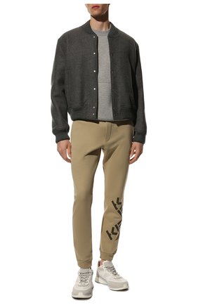 Мужские хлопковые джоггеры kenzo sport KENZO бежевого цвета по цене 24250 руб., арт. FB65PA7174MS | Фото 2 Мужские хлопковые джоггеры kenzo sport KENZO бежевого цвета, арт. FB65PA7174MS | Фото 2 (Материал внешний: Хлопок; Длина (брюки, джинсы): Стандартные; Силуэт М (брюки): Джоггеры; Стили: Спорт-шик)