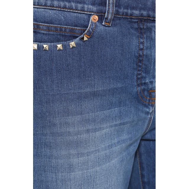фото Укороченные расклешенные джинсы с шипами valentino