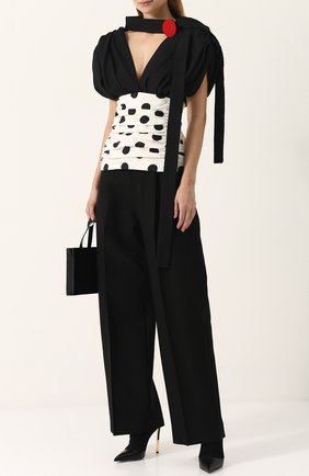 Женские черные однотонные шерстяные брюки со стрелками Jacquemus, арт. 17APA04 купить в ЦУМ | Фото №1 Однотонные шерстяные брюки со стрелками Jacquemus черные | Фото №1