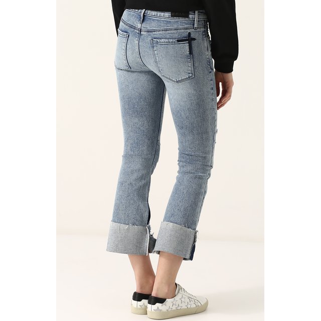 фото Укороченные расклешенные джинсы с потертостями rta