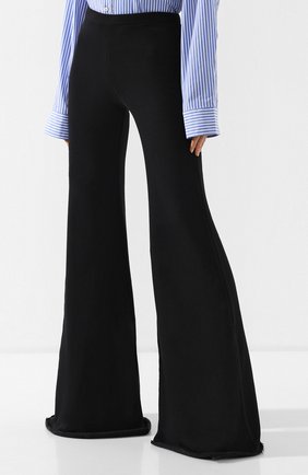Женские черные расклешенные брюки из хлопка Vetements, арт. WSS197009 купить в ЦУМ | Фото №3 Расклешенные брюки из хлопка Vetements черные | Фото №3