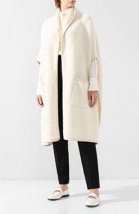 Женская кремовая шерстяное пончо Burberry, арт. 8007230 купить в ЦУМ | Фото №3 Шерстяное пончо Burberry кремовая | Фото №3