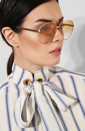 Женские солнцезащитные очки GUCCI золотого цвета по цене 26050 руб., арт. GG0138 007 | Фото 2 Женские солнцезащитные очки GUCCI золотого цвета, арт. GG0138 007 | Фото 2